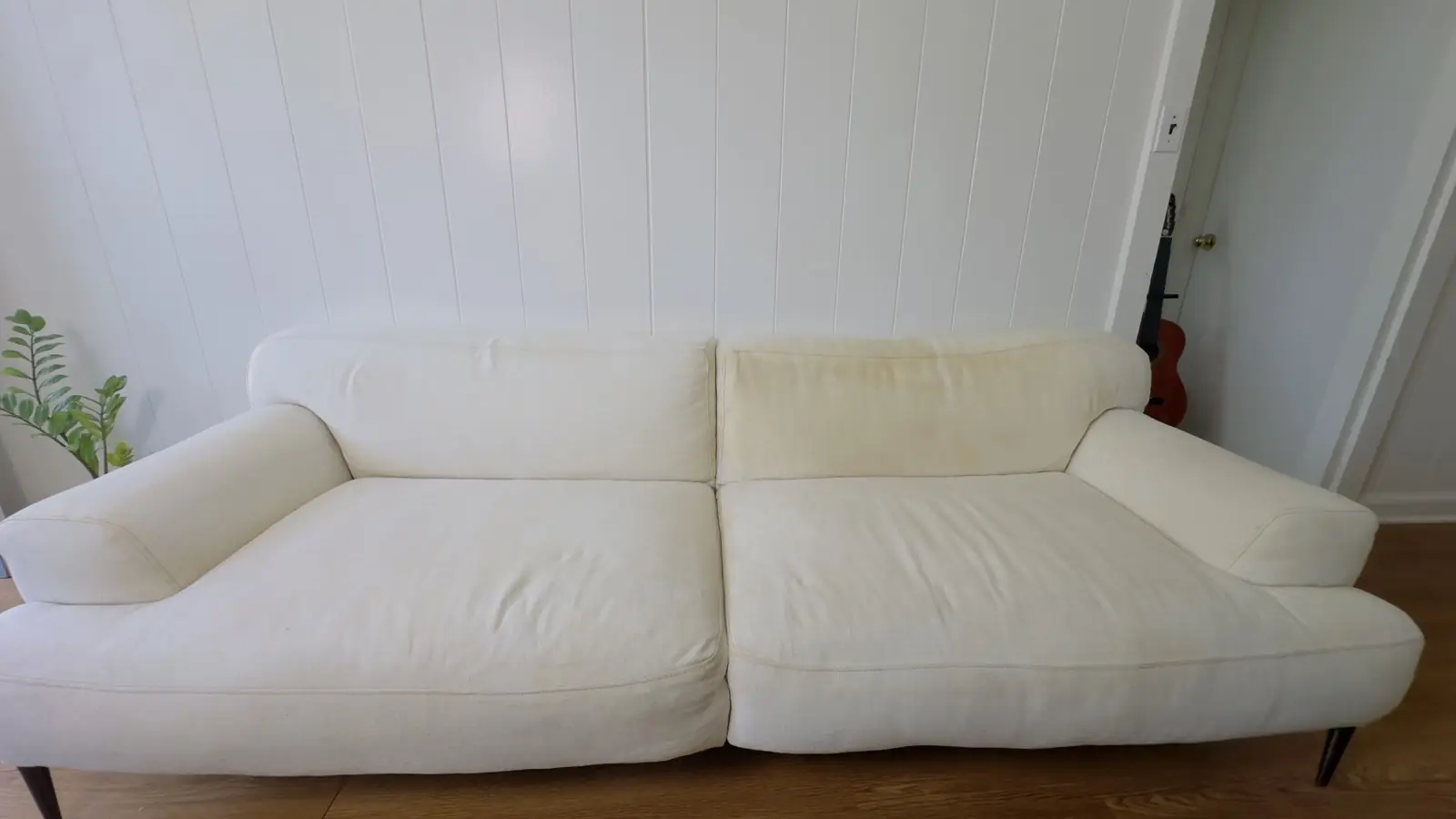 White linen sofa — during cleaning